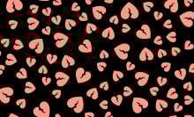 Pink hearts on a black background