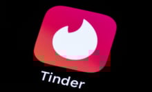 tinder logo displayed on smart phone