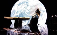 Firefly Aerospace's Blue Ghost lander's solar panel reflecting Earth in space