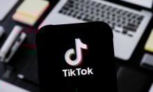 A TikTok logo seen displayed on a smartphone.