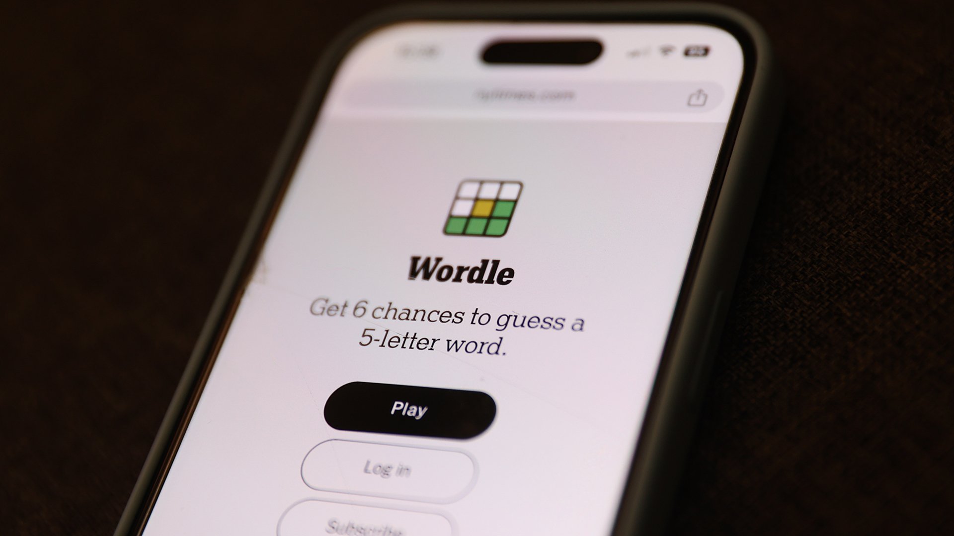 A close-up of a Wordle game open on a smartphone.