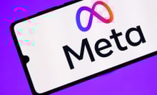 meta logo on a phone