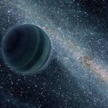 An artist's conception of a gaseous exoplanet traveling through space.