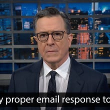 A man in a suit on a talk show stage stands close to the camera, looking serious. The caption at the bottom reads, "The only proper email response to that is..."