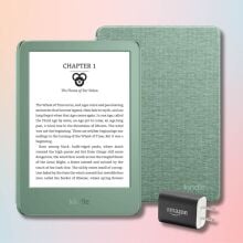 matcha colored kindle, case, and power adapter against a light pink, light blue, and light yellow gradient background