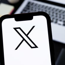 In this photo illustration, a X (Twitter) logo is seen displayed on a smartphone.