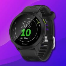 garmin forerunner 55 smartwatch against a pink and blue gradient background