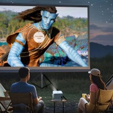 couple watching Portable Projector with avatar 2 on screen