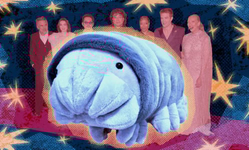 A creeper plush in front of the "Mickey 17" cast.