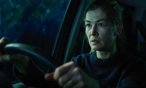 Rosamund Pike is behind the wheel of the car-set thriller "Hallow Road." 