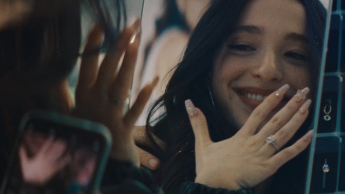 Mikey Madison as Ani flashing wedding ring