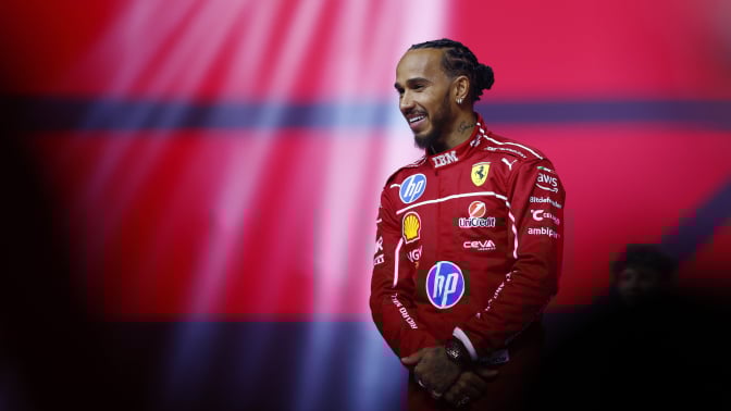 Lewis Hamilton of Great Britain and Scuderia Ferrari looks on