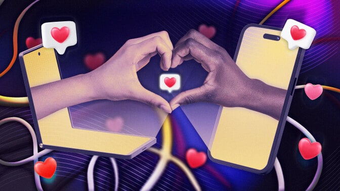 two hands reaching out of laptops to form a hand heart