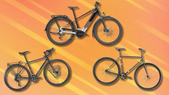 three black bicycles on an orange background with lighter orange streaks running through diagonally