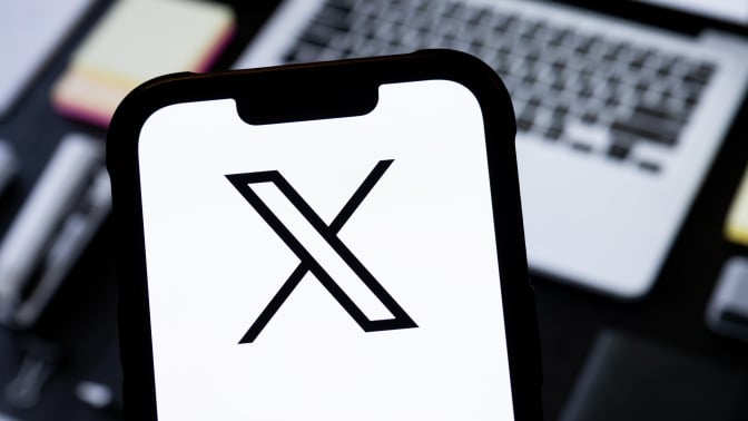 In this photo illustration, a X (Twitter) logo is seen displayed on a smartphone.
