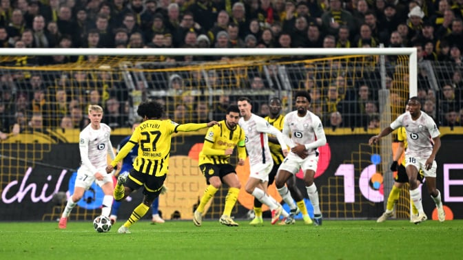 Karim Adeyemi of Borussia Dortmund scores