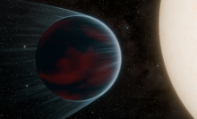 An artist's conception of a Neptune-size exoplanet orbiting close to its star.