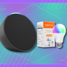 An image showcasing a Black Friday/Cyber Monday deal featuring a charcoal-colored Amazon Echo Pop smart speaker and a box of Amazon Basics smart bulbs against a colorful teal and purple background.