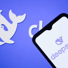 The DeepSeek logo is seen displayed on a mobile phone screen. 