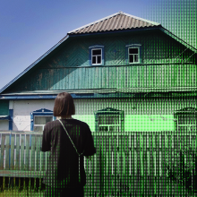 a woman standing in front of a composite of a digitized house