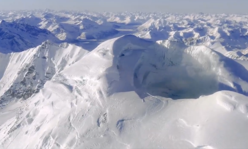 A view captured from a plane passing over the summit crater of Alaska's Mount Spurr in early February 2025.